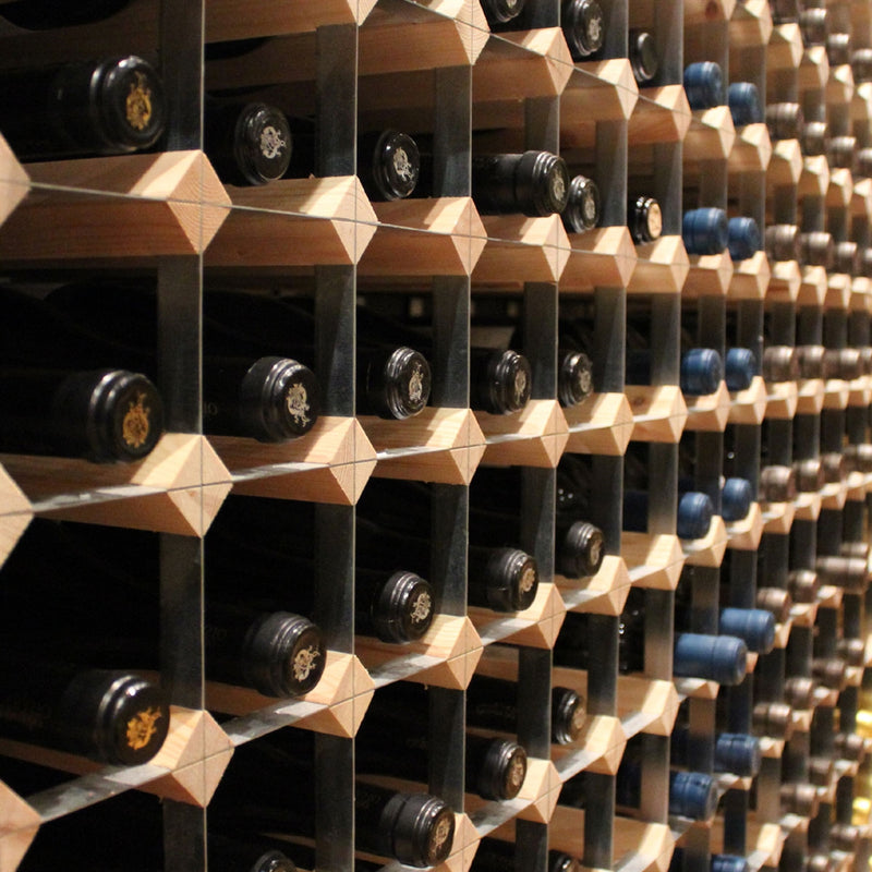 Large wine storage featuring wood and metal.