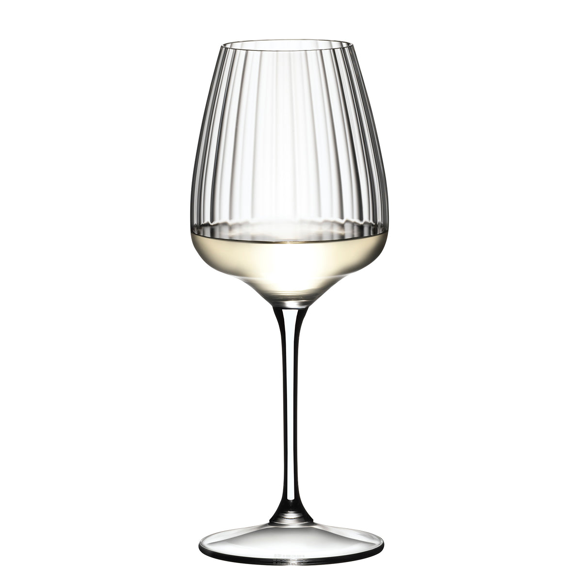 A Riedel Restaurant Grape Optical White Wine / Champagne / Spritz Glass (590ml) from Riedel, made from lead-free crystal and featuring vertical optical lines, is half-filled with white wine and stands against a plain white background.