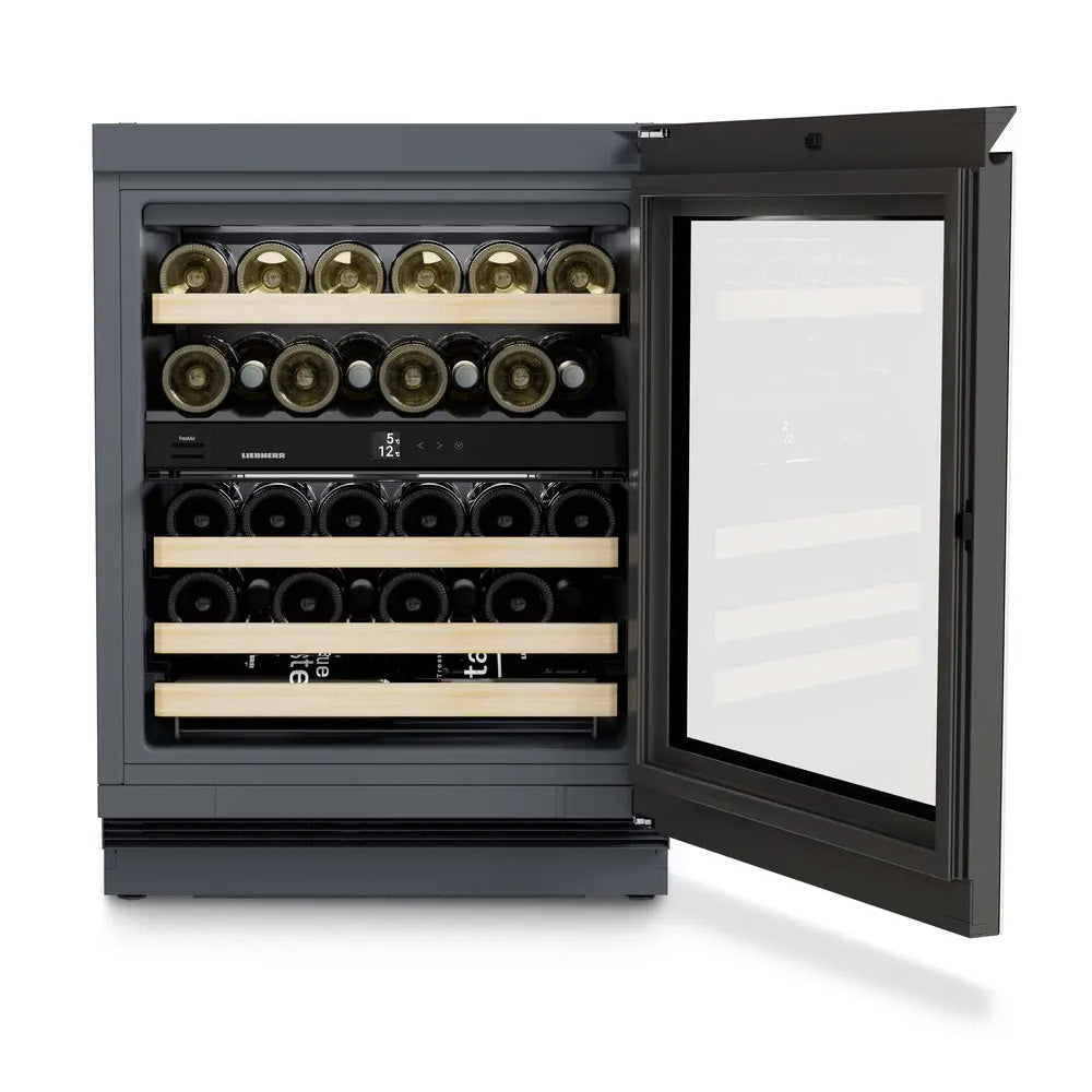 The Liebherr Vinidor 32 Bottle 2-Temperature Undercounter Wine Cabinet (UWgb 3632) features a sleek black design, glass door, wooden shelves for horizontal bottles, and dual temperature zones for precise wine storage.