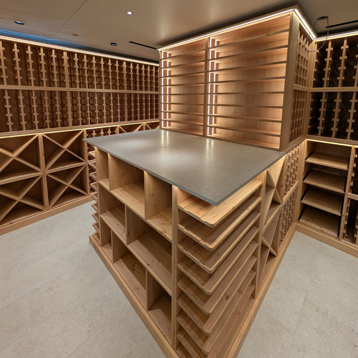 Wooden wine cellar with a central table in a modern interior setting