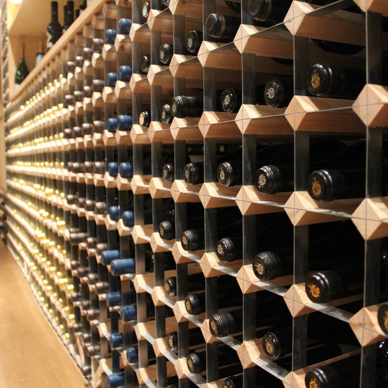 Large wine storage featuring wood and metal.