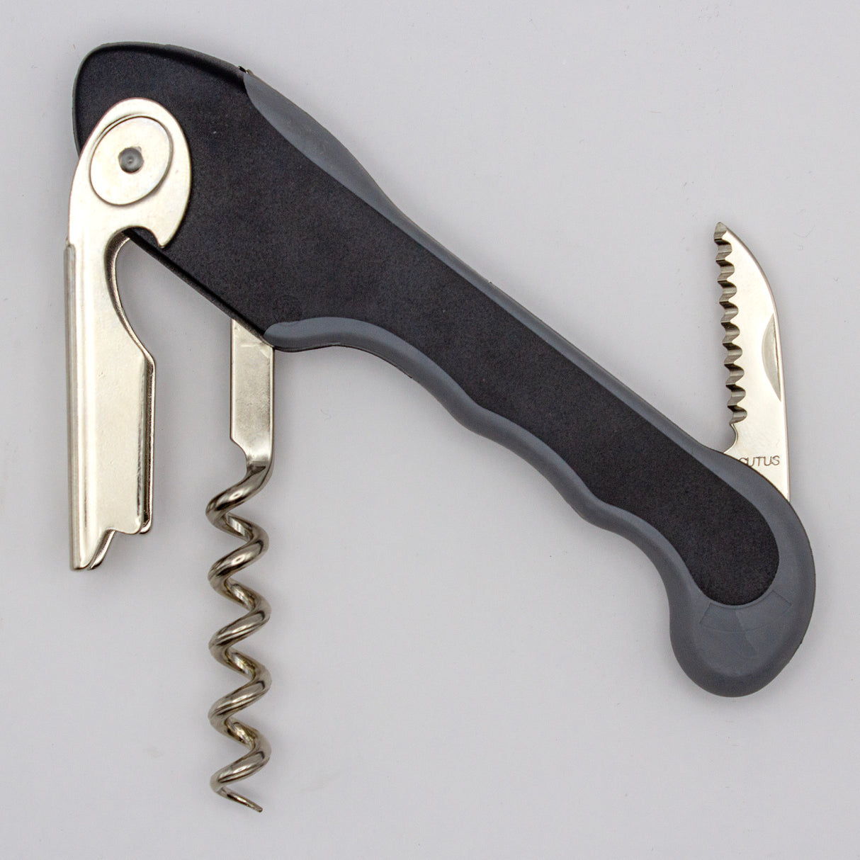 The Soft Touch 001 Single Lever Waiter's Friend Corkscrew by Soft Touch, featuring a black and silver design with an extended bottle opener and serrated foil cutter, is displayed against a plain light background.