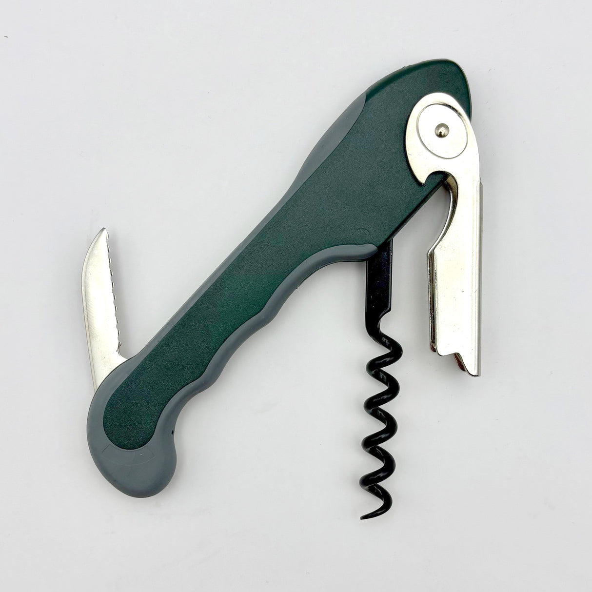 The Soft Touch 001 Single Lever Waiter's Friend Corkscrew by Soft Touch is shown in green and gray on a white background, with its foil cutter, lever, and spiral worm extended. This convenient bottle opener features a single lever design for effortless uncorking.