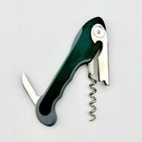 The Soft Touch 001 Single Lever Waiter's Friend Corkscrew by Soft Touch, featuring a green handle, foil cutter, and bottle opener attachment, is displayed fully extended on a plain white background.
