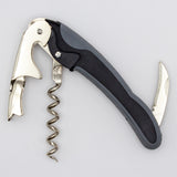 The Soft Touch 002 Double Lever Waiter's Friend Corkscrew by Soft Touch, featuring a metal and black plastic construction with a folding knife and bottle opener, is displayed against a plain white background.