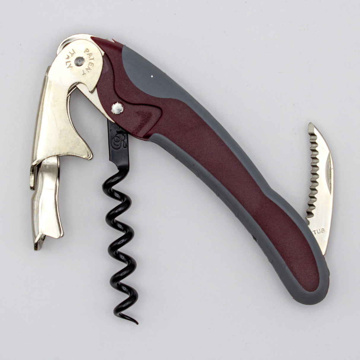 The Soft Touch 002 Double Lever Waiter's Friend Corkscrew by Soft Touch, made from metal and plastic, features a fold-out spiral, bottle opener, and small serrated knife, and is shown unfolded on a plain background.