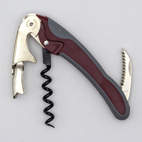The Soft Touch 002 Double Lever Waiter's Friend Corkscrew by Soft Touch, made from metal and plastic, features a fold-out spiral, bottle opener, and small serrated knife, and is shown unfolded on a plain background.
