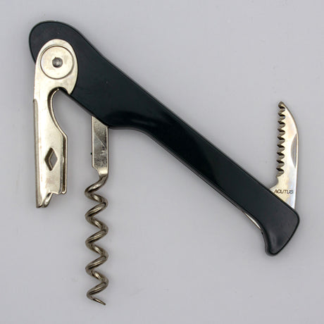 A Soft Touch 003 Single Lever Waiter's Friend Corkscrew by Soft Touch, in black and silver, featuring a bottle opener, foil cutter, and spiral screw, is photographed on a plain light background.
