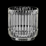 A clear, empty Riedel Restaurant Bar Rituals - Rocks Tumbler 283ml (0421/02), crafted from lead-free crystal with vertical ridges, sits centered on a black background.