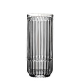 A set of Riedel Restaurant Bar Rituals highball tumblers, each with a 321ml capacity and featuring vertical ridges and a slightly flared rim, is crafted from lead-free crystal and stands upright on a white background.