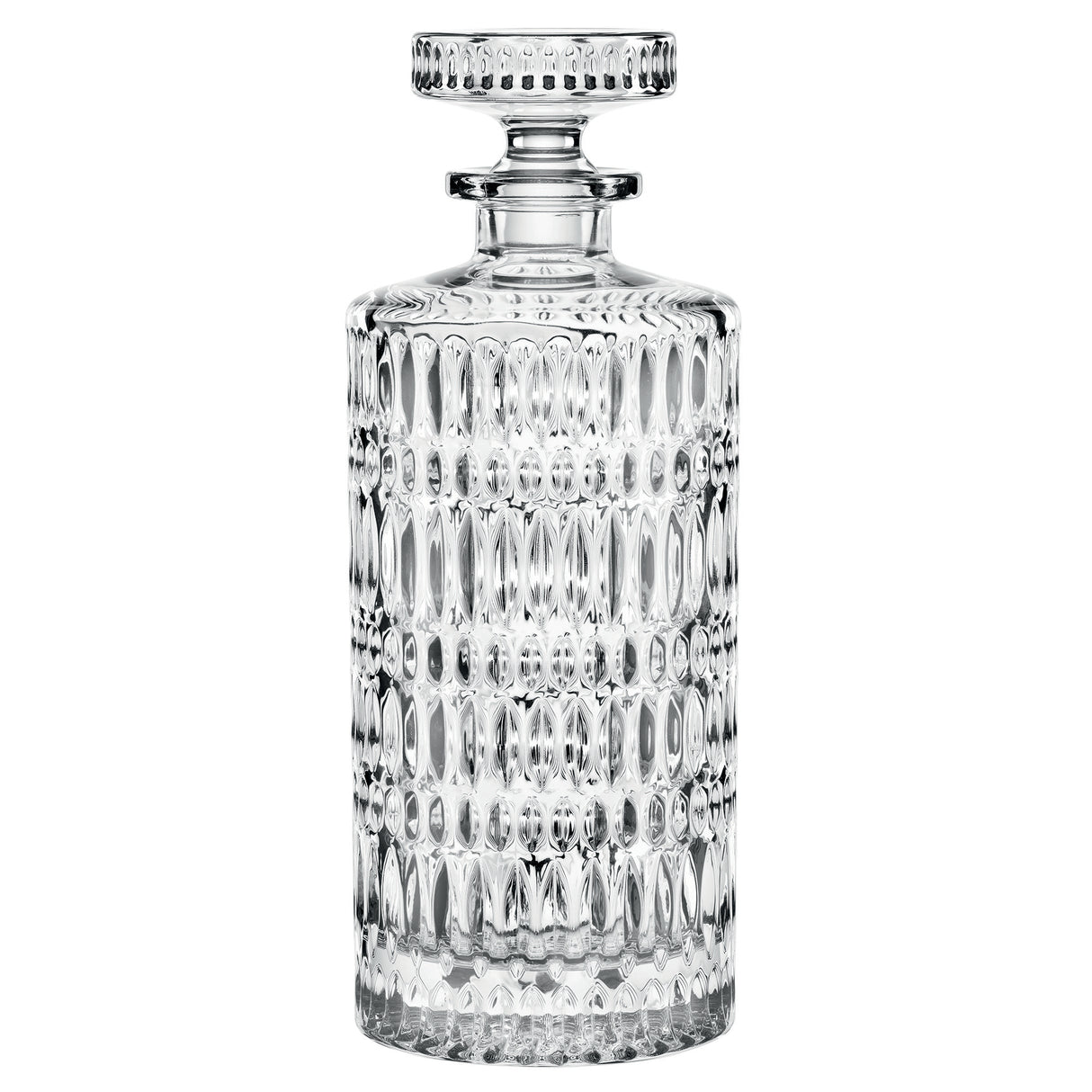 A clear, textured crystal glass decanter with a round stopper, featuring a geometric pattern and vertical ridges, is set against a white background. The Nachtmann Ethno Whisky Decanter & Two Glass Set by Nachtmann is an elegant addition that complements any whisky collection or your favorite tumblers.