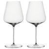 A set of two clear crystal wine glasses with a slender stem, designed for red wine.