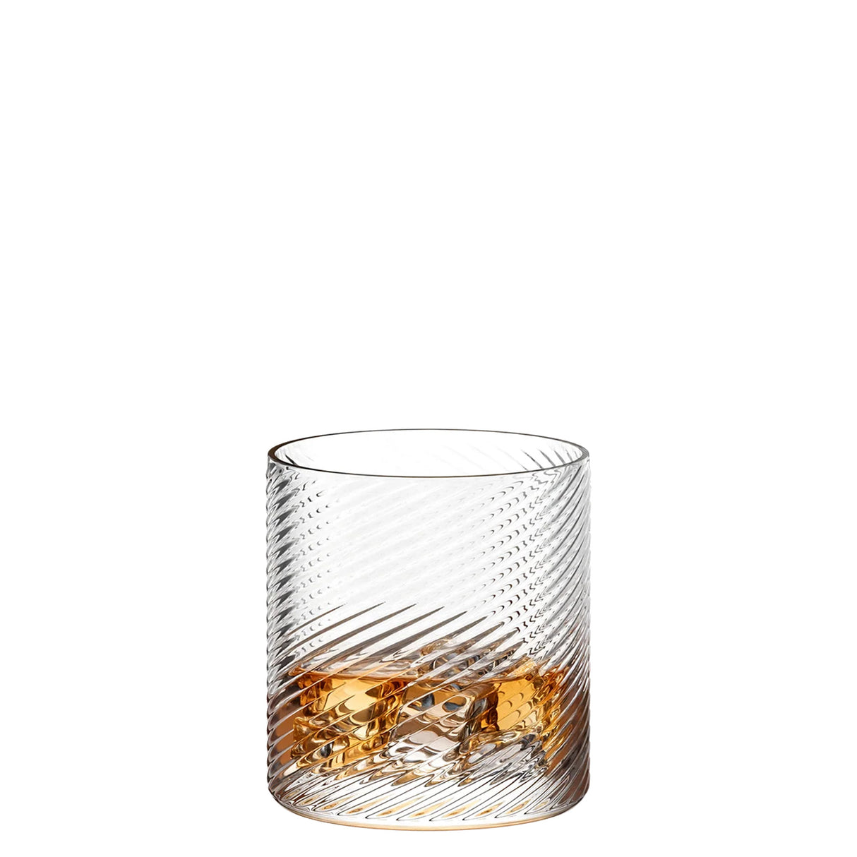 Clear glass with textured design filled with amber liquid on a white background