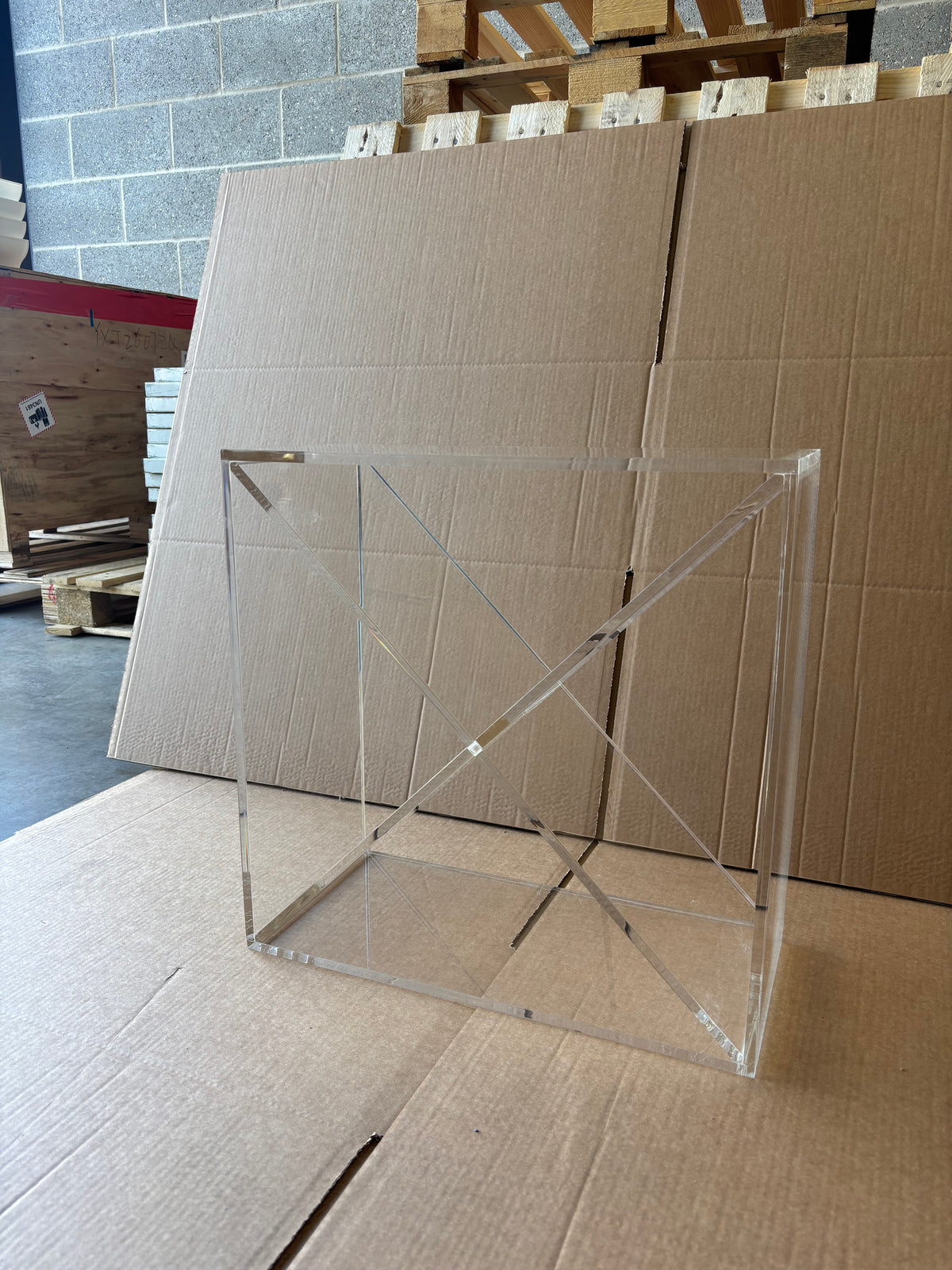 Ex-Display Clear Perspex Wine Cube – 225mm Deep - Approx. 24 Bottles, a square clear acrylic wine display cube with an X-shaped divider inside.