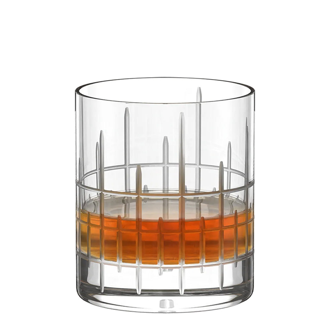 A Stölzle Manhattan Bar Whisky Tumbler 320ml crystal glass with a vertical and horizontal etched grid pattern, containing a measure of amber liquid.
