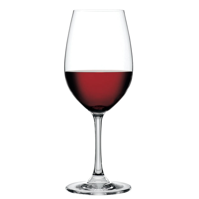 A Spiegelau Restaurant Winelovers Red Wine Glass (460ml), half-filled with red wine and set against a plain white background, highlights the refined elegance of Spiegelau’s premium restaurant glassware.