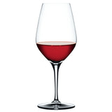 A Spiegelau Restaurant Authentis Red Wine Glass (480ml) from the set of 12, partially filled with red wine, stands elegantly on a white background.