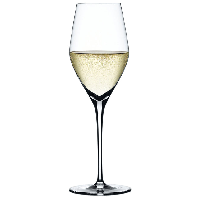 A Spiegelau Restaurant Authentis Champagne Glass (220ml), crafted from crystal by Spiegelau, is filled with pale sparkling wine and displayed against a white background.