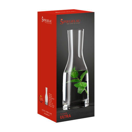 A red Spiegelau box showcases a clear Spiegelau Ultra Wine / Water Carafe 500ml with mint leaves inside. The packaging displays the Spiegelau brand logo, a product image, and the text "In-Carafe ULTRA" on the front, emphasizing this stylish carafe as an ideal choice for serving wine or water at any occasion.