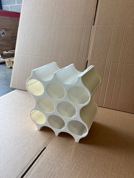 White Plastic Wine Rack – 10 Bottle Capacity, a white plastic modular wine rack with ten circular slots for wine bottle storage.