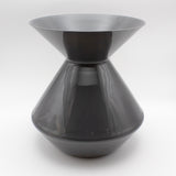 Black spittoon on a white background