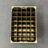 A top-down view of the USED - GREAT CONDITION Wineware Wine Glass Storage Box (190mm high, 35 cells) with compartments for organizing items, placed on a gray carpeted floor.