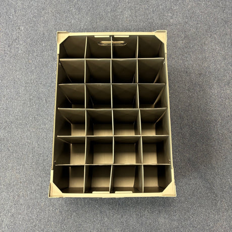 A top-down view of the Wineware USED - GREAT CONDITION Wine Glass Storage Box (240mm high, 24 cells) with multiple square compartments in a grid, placed on a gray carpeted floor.