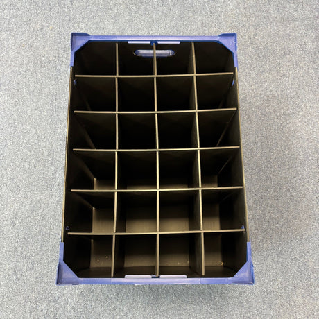 A top-down view shows a USED - GREAT CONDITION Wineware Wine Glass Storage Box (255mm High, 24 cells) made of durable polypropylene with multiple rectangular compartments, placed on a grey carpeted floor.