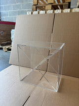 Ex-Display Clear Perspex Wine Cube – 300mm Deep - Approx. 24 Bottles: a clear acrylic wine storage cube with an X-shaped divider inside, serving as a modern wine display.