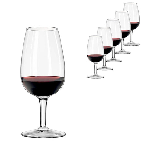A Luigi Bormioli ISO Type Wine Tasting Glass 21.5cl filled with red wine is in the foreground, with five more glasses from the Luigi Bormioli set of 6 for professional tastings arranged in the background.