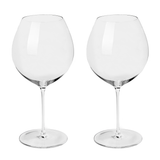 The Richard Brendon The Occasional Collection Burgundy Wine Glass Set of 2 features clear, long-stemmed glasses crafted from mouth-blown crystal, shown side by side on a white background.