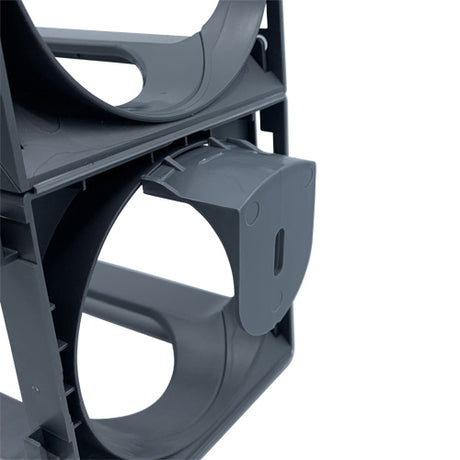Close-up of a gray plastic rack featuring circular compartments, shown partially stacked to highlight its modular design. This resembles the Stakrax Plastic Wine Rack Black Wall Brackets (Set of 4) by Stakrax, with one section displaying a slotted panel for customizable wine storage.