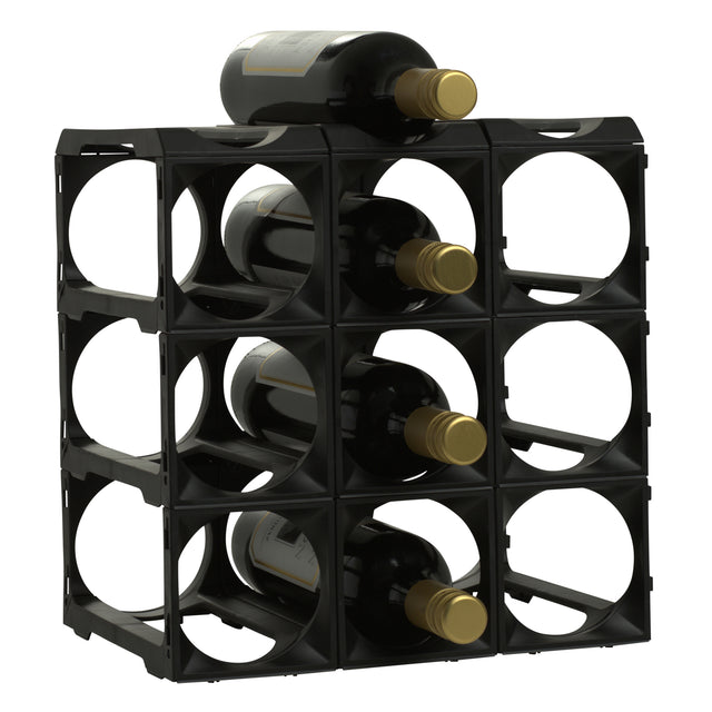 The Stakrax 12 Bottle Plastic Wine Rack in black by Stakrax is an expandable modular rack, shown on a white background, holding wine bottles with gold caps arranged horizontally.
