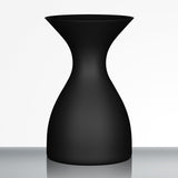 The Sydonios Small Wine Tasting Spittoon 630ml in black, featuring a matte hourglass silhouette evocative of professional wine tasting accessories, is displayed on a reflective surface against a plain white background.