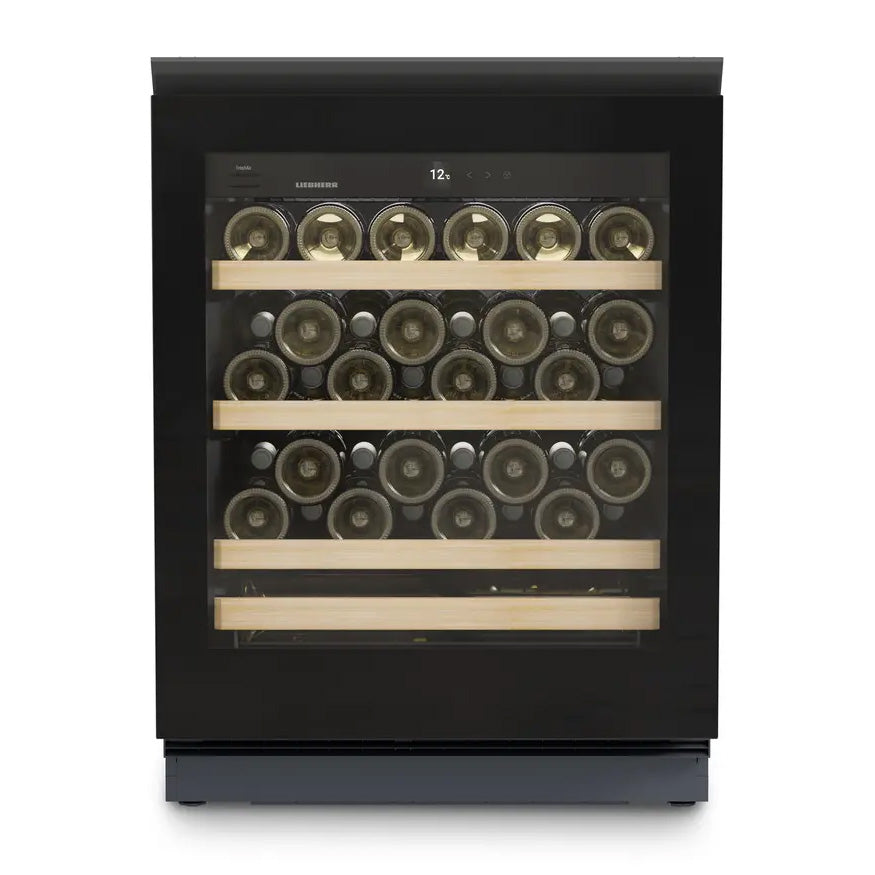 The Liebherr Vinidor UWgb 3631 is a single temperature undercounter wine cabinet with a black glass door and three wooden shelves for horizontal bottle storage—ideal for ageing up to 44 bottles.