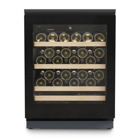 The Liebherr Vinidor UWgb 3631 is a single temperature undercounter wine cabinet with a black glass door and three wooden shelves for horizontal bottle storage—ideal for ageing up to 44 bottles.