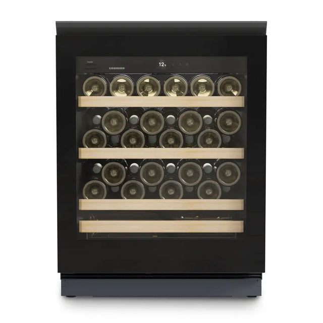 The Liebherr Vinidor UWgb 3631 is a single temperature undercounter wine cabinet with a black glass door and three wooden shelves for horizontal bottle storage—ideal for ageing up to 44 bottles.
