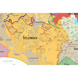 De Long’s Wine Map of South Africa highlights Stellenbosch and nearby regions, featuring labeled towns, roads, vineyards, grape varieties, False Bay to the southwest, and Hottentots Holland mountains to the east.